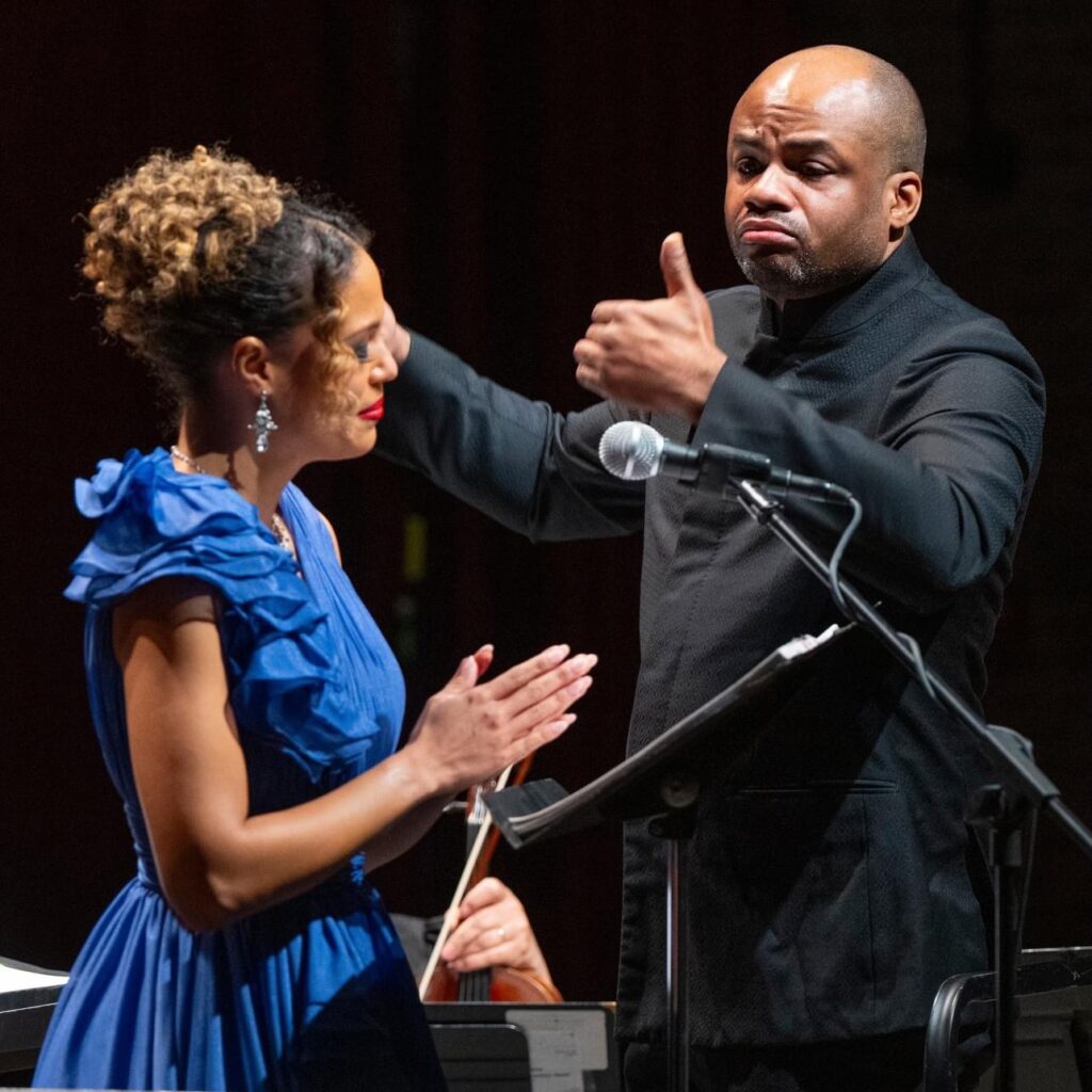 Rebecca L. Hargrove (l) sings at Colour of Music Festival
