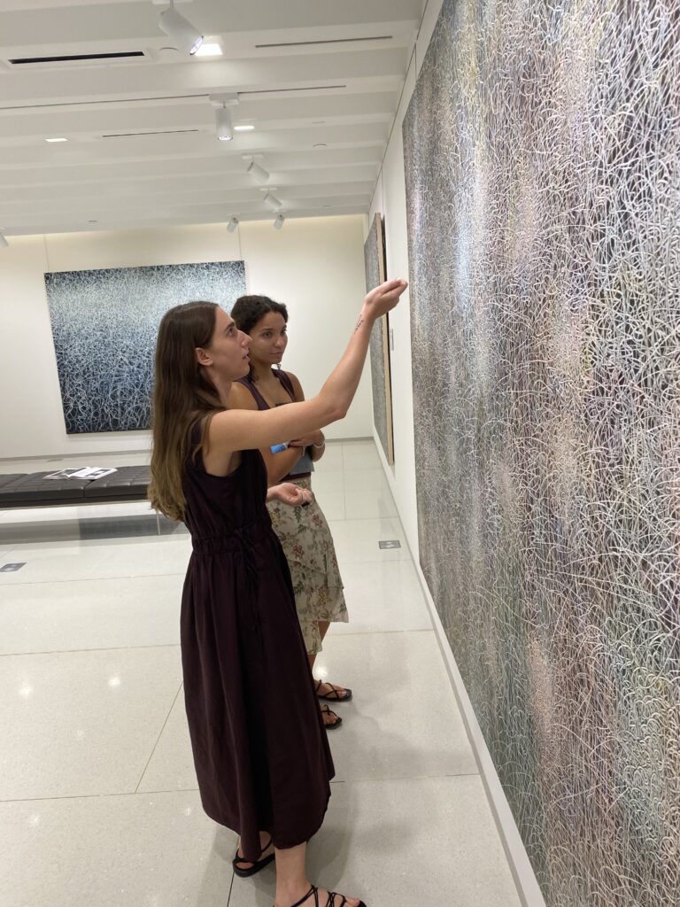 Vilcek Curatorial Fellow Olivia Wrobleski gives a tour to TAF writer Ella Bowers at the Vilcek Foundation (photo by Amos White V)